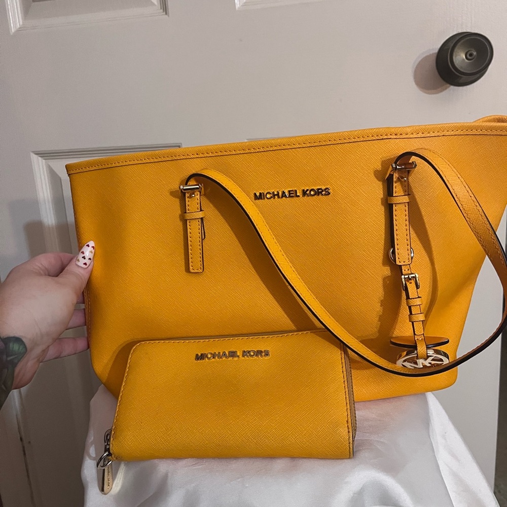 Michael Kors yellow shoulder bag with matching wallet